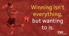 a man is kicking a soccer ball with the words winning isn't everything, but wanting to is