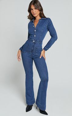 Elevate your denim game with our Vivi Jumpsuit in Indigo Wash. This button-front wide leg jumpsuit is the perfect blend of casual and chic. Crafted from soft cotton denim, it features short sleeves and a collar for an effortlessly cool look. Whether you're headed to brunch or out for a night on the town, this jumpsuit will have you looking stylish and on-trend. Pair it with your favorite sneakers or dress it up with heels - either way, you'll be turning heads wherever you go. Shop now and make a statement in our Vivi Jumpsuit! Product Details: Buttons detail Front pockets Wide leg jumpsuit Denim fabric Collar neckline Casual wear Short sleeve Cotton material Size and Fit Size S / 8 length: 42cm / 16.54in Material and Care 66.4% Cotton, 28.4% Polyester, 3.2% Viscose, 2% Spandex No Stretch N Coveralls Women Fashion, Basic Black Dress, Neon Outfits, Bachelorette Dress, Spring Maxi Dress, Navy Bridesmaid Dresses, Spring Capsule Wardrobe, Long Sleeve Knit Dress, Strapless Tops