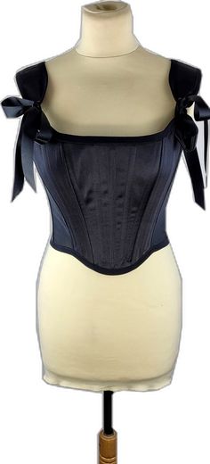 Black Overbust Corset With Adjustable Straps, Black Underbust Corset With Adjustable Straps, Black Underbust Corset Belt With Straps, Black Overbust Corset Belt With Straps, Evening Underbust Corset With Adjustable Straps, Party Corset With Straps In Nylon, Black Corset With Adjustable Straps For Night Out, Black Stretch Corset With Corset Back, Black Stretch Corset With Bandage Details