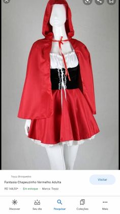 a mannequin dressed in a red cape and black dress with white trims