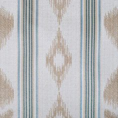 an upholstered fabric with blue and beige stripes