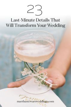 a person holding a wine glass with flowers in it and the words 25 last - minute details that will transform your wedding