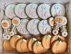 a box filled with lots of decorated cookies