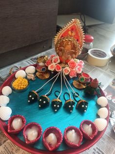 there is a cake decorated with seashells and flowers