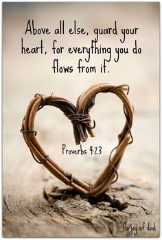 a heart - shaped piece of wood with the words prove all else, guard your heart, for everything you do flows from it