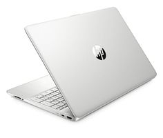 an open laptop computer sitting on top of a white surface