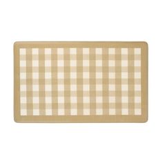 a beige and white checkered placemat