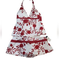 White With Red Floral Print 2 Piece Swimsuit From Jantzen. Halter Style Top With Light Padding. Bottom Is Skirt Style With Side Split. Nwt. Size 12 Fitted One-piece Swimwear For Holiday, Summer Holiday Tankini, Red Floral Print Sleeveless Swimwear, Red One-piece Swimwear With Floral Print, Red Printed Tankini For Summer, Red Floral Print One-piece Swimwear, Red Floral One-piece Swimwear, Fitted White Tankini For Summer, Red Halter Neck Tankini For Summer