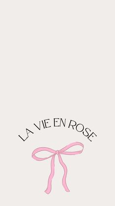 the words la vie en rose are written in black ink on a white background with a pink ribbon