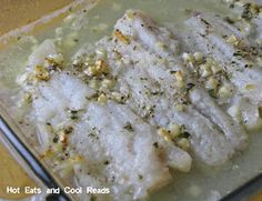 fish and rice in a bowl with a fork