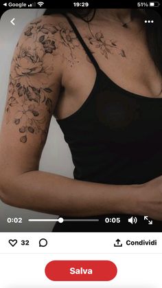 the woman is showing off her tattoo on her arm and chest, while she has an mp3 player in front of her