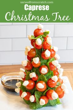 a christmas tree made out of tomatoes and basil leaves with text overlay that reads, how to make a caprese christmas tree