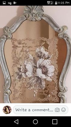 a mirror with flowers painted on it and the words write a comment written in english