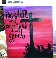 an image of a cross painted with acrylic paint on canvases that says, be still and know that i am god