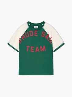 Premium tee crafted from soft, lightweight fabric. Rhude Sail Team jersey graphic showcased on the front. Features a comfortable and relaxed custom Rhude fit. The stripe design on the sleeves adds a sporty touch to this classic short sleeve.   100% COTTON JERSEY DRY CLEAN ONLY WE RECOMMEND TAKING YOUR STANDARD SIZE Sporty Crew Neck T-shirt With Letter Print, Sporty Raglan Sleeve T-shirt For Summer, Sporty Cotton Jersey Top With Letter Print, Relaxed Fit Jersey T-shirt With Letter Print, Sporty Relaxed Fit Cotton Jersey T-shirt, Varsity Jersey T-shirt With Letter Print, College Raglan Sleeve T-shirt With Letter Print, Letter Print Raglan Sleeve T-shirt For College, Sporty Relaxed Fit T-shirt With Letter Print