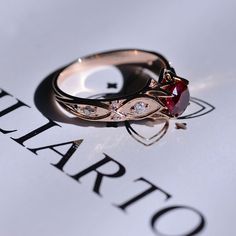 a close up of a ring on top of a piece of paper