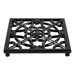 a black square fire pit cover with an intricate design