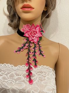 "Embroidered flower choker  Size: 16\" with 3\" extender  Flower 4.5\" by 9\"  Please let us know if you need different sizes  Returns & exchanges We don't accept returns or exchanges. But please contact us if you have any problem with your order. Request a cancellation within 24 hours of purchase The following item can't be returned or exchanged  Because  of the nature of these items, unless they arrive damaged or detective, I can't except returns for: Custom or personalized orders Perishable p Adjustable Pink Choker For Party, Pink Adjustable Choker For Party, Adjustable Flower Choker Necklace, Pink Handmade Flowers Necklace For Party, Pink Flower Necklace For Wedding, Adjustable Pink Flower Necklace For Wedding, Flower Shaped Choker For Spring Party, Floral Choker For Spring Parties, Adjustable Pink Choker For Wedding