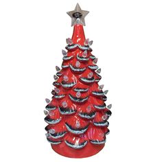 a red ceramic christmas tree with silver stars