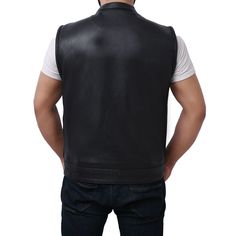 This cowhide leather vest is durable and supple. Its mesh liner will keep you cool in summer. This Jett Vest is sleek and versatile: It’s decently warm, light, packs down small, and looks the part for both casual and active use. Features: 2 buttoned chest pockets 2 buttoned slash pockets 2 concealed carry pockets with bullet snaps and tapered holsters Club style with one inch collar and covered snaps Cropped center zipper Interior cellphone pocket on left side Single back panel (Up to 5XL) YKK z Sleeveless Fitted Leather Biker Jacket, Fitted Sleeveless Leather Biker Jacket, Casual Sleeveless Vest For Biker Events, Black Leather Moto Vest, Leather Vest For Motorcycling In Fall, Leather Vest For Motorcycling, Fall Season, Casual Sleeveless Outerwear For Biker Events, Leather Sleeveless Vest For Motorcycling, Leather Biker Vest Sleeveless