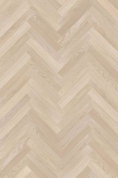 an image of wood flooring that looks like chevrons