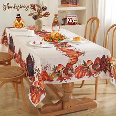 the table is set for thanksgiving dinner with turkeys on it