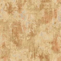 an old, worn and stained wallpaper background with faded paint on the surface in shades of brown