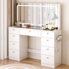 a white vanity with mirror and lights on it