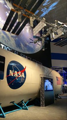 the space shuttle is on display at an exhibition