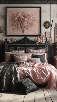 a bed with pink and black comforters in a room next to a painting on the wall