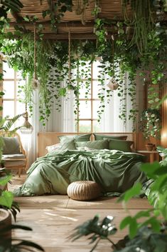 a bedroom with lots of green plants hanging from the ceiling and bed in front of it