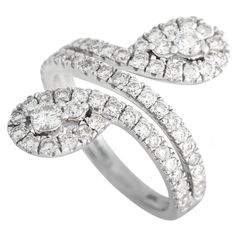 two white gold rings with diamonds on them