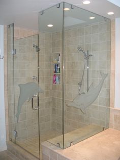 a walk in shower sitting inside of a bathroom