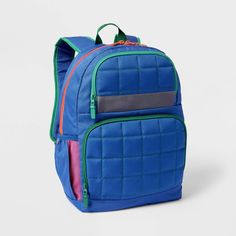 Add trendsetting style to your kid's bag collection with the Novelty 17-Inch Backpack from Cat & Jack™️. This softside backpack features a blue hue with allover quilted pattern for an appealing look. It's designed with a laptop pocket, side pockets and a front zip pocket to help carry organize all their essentials. Plus, this blue school bag allows for convenient carrying with the sternum strap and backpack straps. Simply toss it in the machine for easy cleanup. Cat & Jack™: Designed for all chi Blue Rectangular Backpack For Students, Blue Standard Backpack For School, Casual Blue Bags, Blue Backpack For Back To School, Blue Rectangular Nylon Backpack, Blue School Backpack For Back To School, Back To School Blue Backpack, Blue School Bag, Animal Backpacks