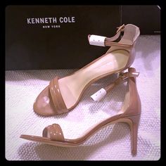 Buff/Nude Color. A Smooth Single Panel Toe Strap. Open Toe, Ankle Strap With Adjustable Buckle Closure. Slim, 4” Approximate Heel. Man Made Upper & Sole Fitted Beige Sandals With Open Heel, Beige Fitted Sandals With Round Toe, Navy Sandals, Toe Ring Sandals, Kenneth Cole Shoes, Block Sandals, Womens Gladiator Sandals, Studded Flats, Vintage Heels