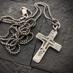 This is a Johnny LTD original piece. We made a mold of this original medieval cross and produced it in sterling silver. This necklace provides a unique piece for yourself or a loved one. The necklace is available in 20 or 24 inches in length and looks great in an open collared shirt or over a t-shirt. Pendant Material: Sterling Silver Necklace Material: Sterling Silver Necklace Clasp: Lobster Clasp Necklace Length: 20-24 inches Pendant Dimensions: 19 x 30.4mm (.74 x 1.2in) General Care: We selec Medieval Cross, Christopher Meloni, Mens Cross Necklace, Silver Cross Necklace, Sterling Silver Cross Necklace, Sterling Silver Cross Pendant, Mens Crosses, Silver Cross Pendant, Mens Chain Necklace