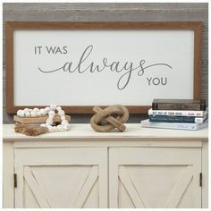 there is a sign that says it was always you on the side of a cabinet