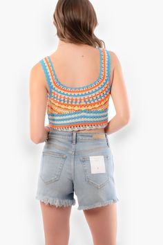 Looking for a way to elevate your summer fashion? Look no further than our Sunny Breezes Striped Crochet Crop Top ! This trendy piece is the perfect addition to your wardrobe, effortless to pair with your favorite denim bottoms for an instantly adorable and stylish look. Made from semi-sheer and stretchy crochet fabric, it features a fitted and flattering bodice that ends at an ultra-cropped hem, making it the go-to top for all your summertime plans.   Features:   Semi-sheer, stretchy crochet fabric  Subtle scoop neckline  Fitted bodice  Ultra-cropped hem  Lightweight and breathable  Sunny Breezes Striped Crochet Cropped Top - Effortlessly Chic Summer Fashion  Embrace laid-back summer style with our Sunny Breezes Striped Crochet Cropped Top. Made from semi-sheer, stretchy crochet fabric, t Spring Crochet Trim Beachwear Top, Spring Beachwear Crochet Top With Crochet Trim, Spring Beachwear Crochet Knit Top, Summer Crochet Trim Beachwear Tops, Spring Beachy Crochet Top With Crochet Trim, Beachy Crochet Top With Crochet Trim For Spring, Spring Vacation Crochet Top With Crochet Trim, Summer Crochet Knit Top For Vacation, Summer Knit Crochet Top