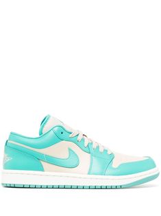 Air Jordan 1 low-top sneakers from NIKE featuring turquoise, leather, panelled design, signature Swoosh logo detail, signature Jumpman motif, round toe, front lace-up fastening, branded insole and ridged rubber sole. | Jordan low-top sneakers Jordan Lows Women, Teal Nike Shoes, Preppy Jordans, Low Jordans, Teal Jordans, Preppy Sneakers, Jordan Lows, Color Cian, Low Jordan 1