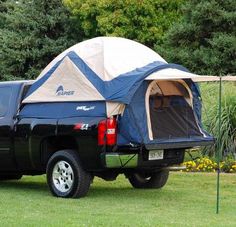 a truck with a tent in the back