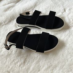 Light Platform Sandals Black And White Size 38 Aka 8 Womens Never Used Black Slingback Sandals With Buckle For Summer, Trendy Black Slingback Sandals For Summer, Trendy Black Slingback Sandals For Beach, Black Flat Sandals For Spring, Black Slingback Sandals With Buckle For Vacation, Black Open Toe Slingback Sandals For Vacation, Black Slingback Sandals With Buckle Closure For Vacation, Black Slingback Sandals For Spring Vacation, Trendy Black Flat Heel Slingback Sandals