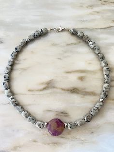 A necklace made of natural stone suitable for holidays and everyday wear, for office and concert, a gift for mom, sister, or a friend for their birthday, wedding day, Christmas, or Valentine's Day. A personalized meaningful gift based on the zodiac sign and moon phase. A large fluorite charm, 0.88 ounces in size, supports hematite beads and hematite inlays. Steel hardware, lobster clasp. The size of the dolomite stones is 8x12 mm. Lithotherapy. Adjustable Gray Gemstone Beaded Necklace, Adjustable Gray Necklace With Gemstone Beads, Adjustable Gray Gemstone Beads Necklace, Gray Single Strand Jewelry As Gift, Gray Single Strand Jewelry As A Gift, White Hand-strung Crystal Necklace For Gift, Gray Gemstone Beads Necklaces For Gifts, Gray Gemstone Beads Necklace For Gift, Handmade Spiritual Gray Necklaces