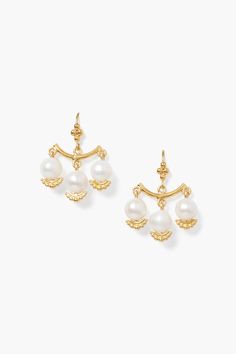 These gold chandelier earrings featuring a trio of white pearl add an opulent touch to any look. 18k gold plated sterling silver, white freshwater pearl. 1 1/8" drop. Handmade in Vietnam. Elegant Pearl White Pearl Chandelier Earrings, Classic White Pearl Chandelier Earrings, Gold Pearl Chandelier Earrings, Luxury White Pearl Drop Chandelier Earrings, Luxury Gold Pearl Drop Chandelier Earrings, Pearl Chandelier Earrings, Pearl Chandelier, Gold Chandelier Earrings, Vintage Style Jewellery