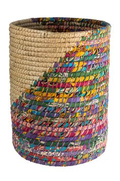 the multicolored basket is made out of woven material and has multiple layers of different colors