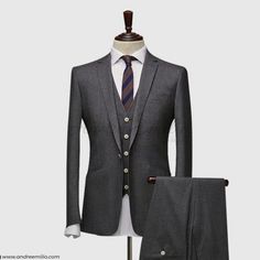 mart, stylish and sleek, Charcoal gray 3 Piece Suit single-breasted jacket, waistcoat and trousers.