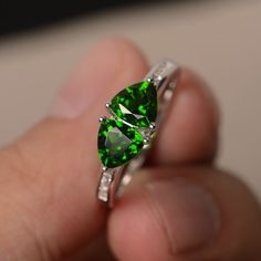 This is a gorgeous handmade creation. Its beauty is its simplicity & Elegance. The 6mm natural chrome diopside is crafted in solid sterling silver and with rhodium plated. It's made to order and it will take about 7-10 days to make it. All item is sent in a beautiful gift box You can realize more lovely stuff clicking the link https://www.etsy.com/shop/knightjewelry?refshopsection_shophome_leftnav Please leave the correct address and you phone number for delivering successfully. Chrome Diopside Ring, Swiss Blue Topaz Ring, Green Gemstone Ring, Green Emerald Ring, Cushion Cut Ring, Birthday Ring, Sterling Silver Engagement Rings, Green Gemstones, Multi Stone Ring