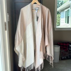 Go Soft And Sweet For Sweater Weather With This Plush Poncho From Soia & Kyo! Made With A Fun Fringed Hem And A Light And Airy Colorblocked Design In Pops Of Pink And Cream. One Size 100% Acrylic Open Front Poncho-Style Silhouette Colorblocked Design Scarf Hem W/ Fringe Trim Shoulder To Hem 39" Chic White Cape Outerwear, Oversized White Cape Outerwear, White Long Sleeve Cape For Fall, White Shawl Poncho For Fall, Cozy White Cape For Fall, Open Front Poncho, Design Scarf, Sweater Poncho, Poncho Style