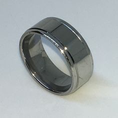 8 . 0mm Size 7 Brand New White Gold Plated With Dented Side Line On Plain Stainless Steel Ring Band Material: White Gold Plated Stainless Steel Ring Size: Size Available - 7 (Sorry Can’t Resize) Stone Set : N/A Measurement : Width Approx: 0 . 3 1" Inches ( 8 . 0 Mm ) Thickest Approx: 0 . 0 7" Inches ( 1 . 8 Mm) Weight Approx: 5 . 9 Grams Item # Km03061927-Ss-Ss20137 Rings For Men Silver, Mlp Redesigns, Gray Ring, Desired Reality, Wire Ring, Stainless Steel Ring, Wire Rings, Round Rings, Rings Simple