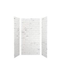 an open white brick wall with two doors on one side and the other half opened