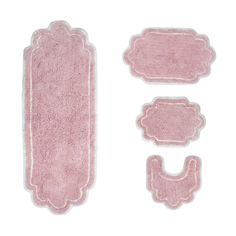 pink bathroom rugs and bath mats on a white background